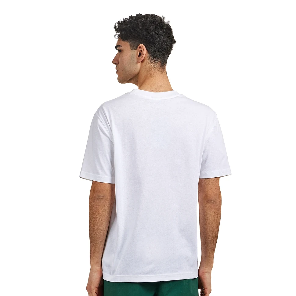 Футболка New Balance Athletics Cotton MT41533WT в Москве в Москве
